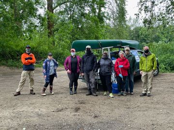 Eighty members of the The Willamette Water Trail steering committee pose together while wearing masks and other personal protective gear after doing a trash clean up on the Willamette River. 